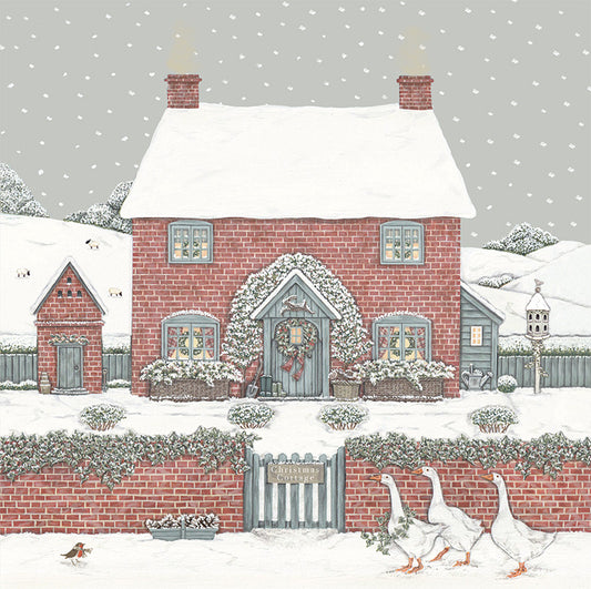 An illustrated card by Sally Swannell of a snowy cottage, with a garden and geese walking past in the lane.