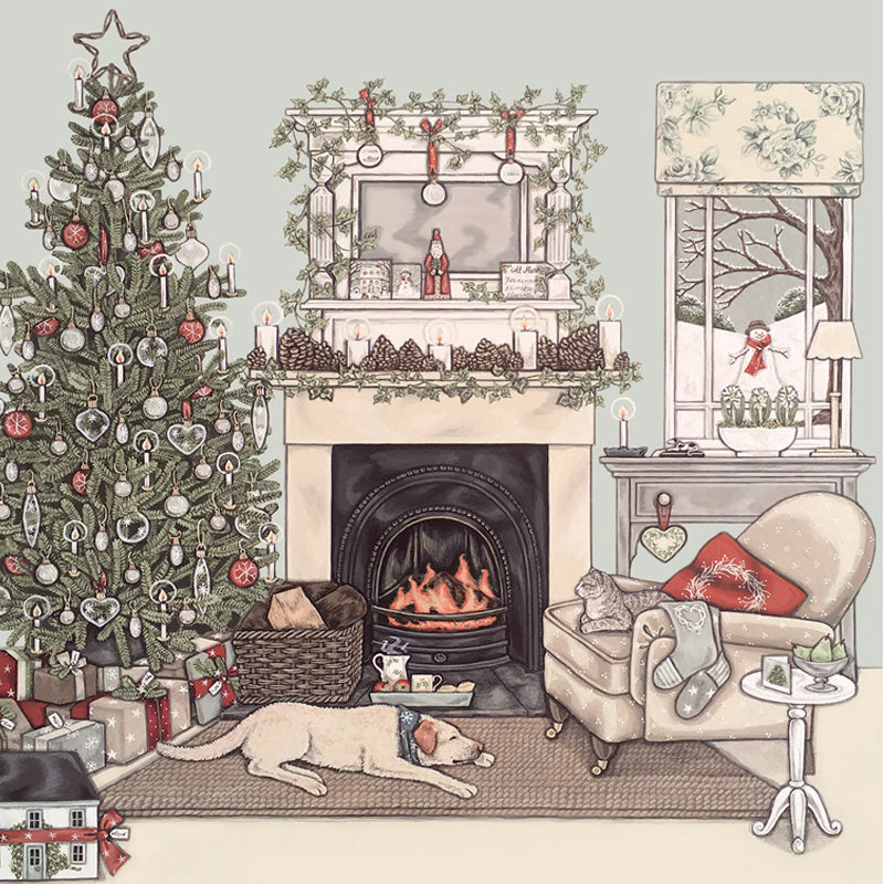An illustrated card by Sally Swannell of a cozy living room with Christmas tree, fireplace, dog, cat, and festive decorations.