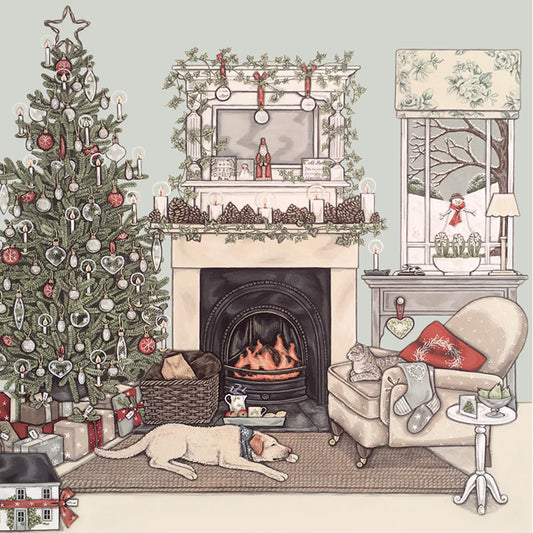 An illustrated card by Sally Swannell of a cozy living room with Christmas tree, fireplace, dog, cat, and festive decorations.