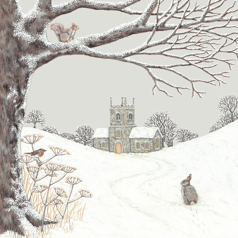 An illustrated card by Sally Swannell of an old country church across a snowy field, overlooked by a red squirrel, robin and rabbit.