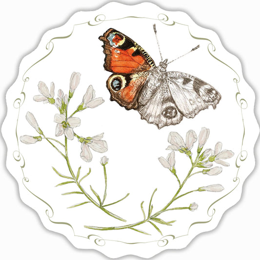 Circular postcard depicting a Peacock butterfly flying away from a Cuckoo Flower. A pretty design around the outside.