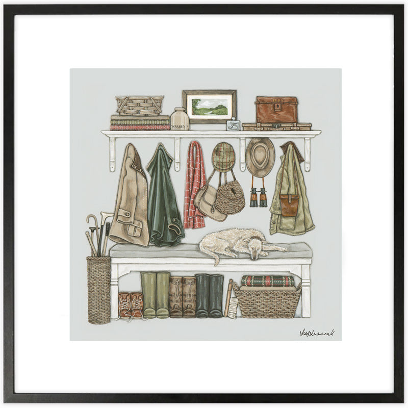 A framed art print featuring a detailed illustration of a cozy, rustic boot room or entryway shelf scene. The scene includes a bench with a sleeping dog, hanging coats, bags, hats, and boots, along with a shelf of books and trinkets, all rendered in muted earthy tones.