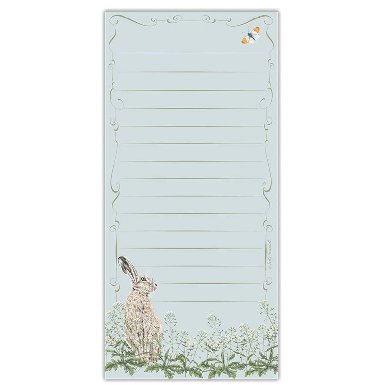 A vertical lined notepad with a pale blue background, featuring a seated hare illustration at the bottom left, small white flowers along the lower edge, and an ornate decorative border around the page.