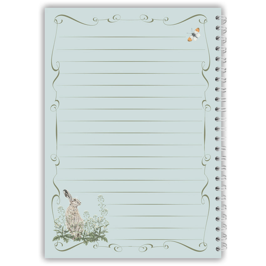 Notebook inside cover with a decorative hare design on a light blue background