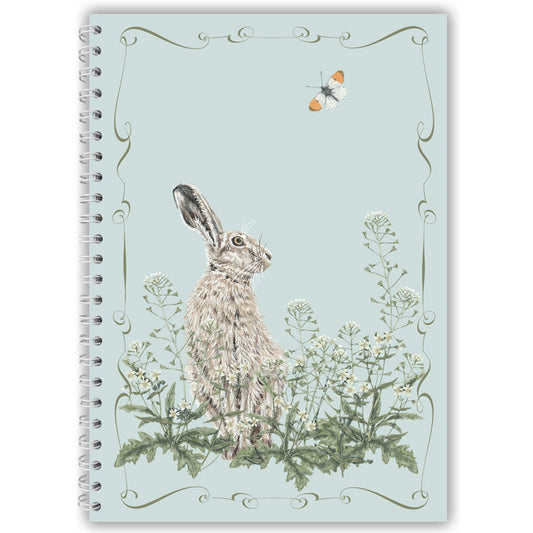 Notebook cover with a hare and wild flowers illustration on a light blue background