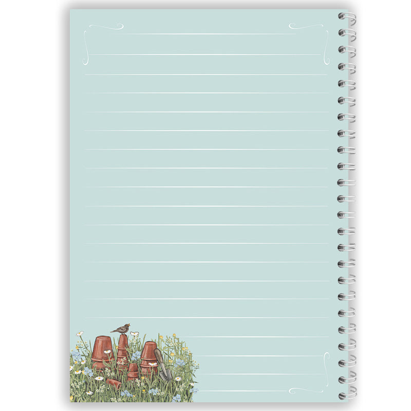 Notebook with bird and flower pot design on a light blue background