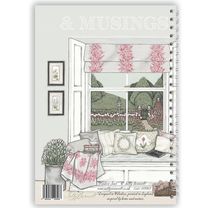 Notebook cover with a window scene, cushions, overlooking a garden.