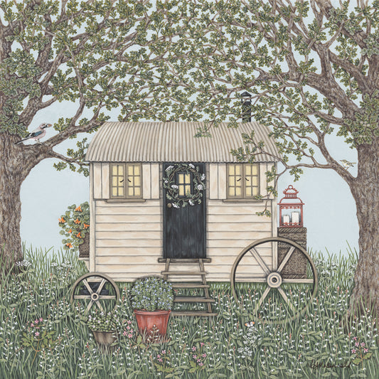 A painted shepherd's hut standing in long grass and wild flowers, between 2 oak trees. There is a jay and a wood warbler in the oak trees, and a lantern on the back of the shepherd's hut.